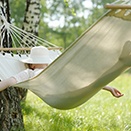 Woman sleeping peacefully in a hammock