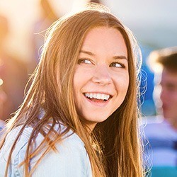 Teenage girl grinning