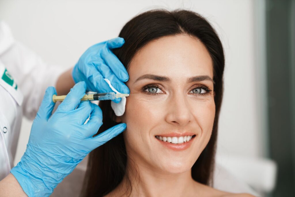 A woman getting a botox injection.